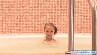 Teen Paris Milan Flaunts Her Body In A Bikini While Soaking In A Jacuzzi