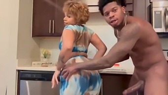 A Black Man Has Sex With An Ebony Woman In The Kitchen.